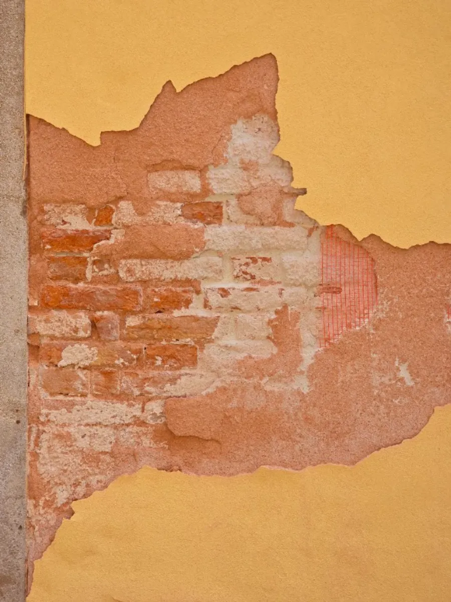 Plaster and brick on a Venetian wall